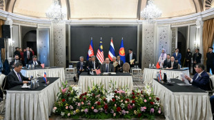 Thailand and Cambodia begin truce talks as fighting drags on