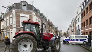 Macron meets French farmers in bid to defuse anger over trade deal